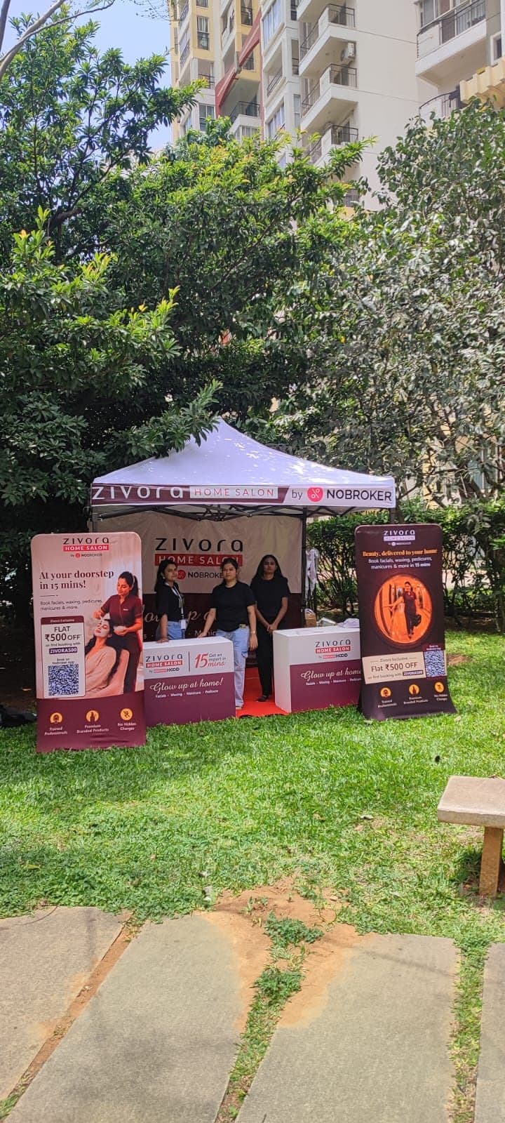 Zivora Home Salon by NoBroker branded gazebo and kiosk setup inside a residential community