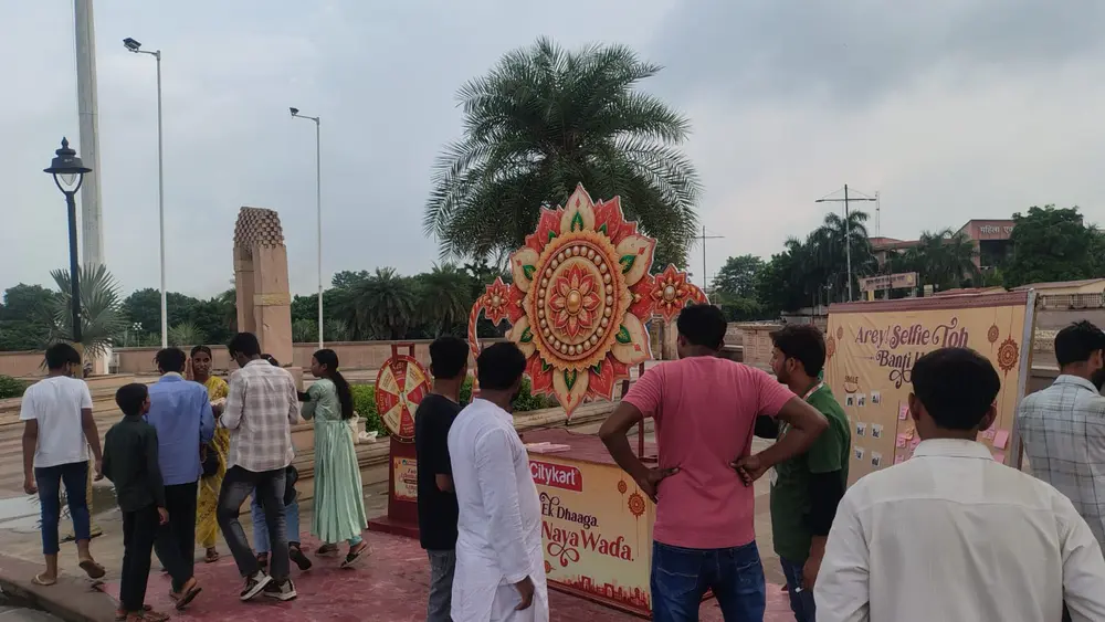 Crowd gathered around the Citykart Rakhi installation and spin wheel at the on-ground activation in Lucknow